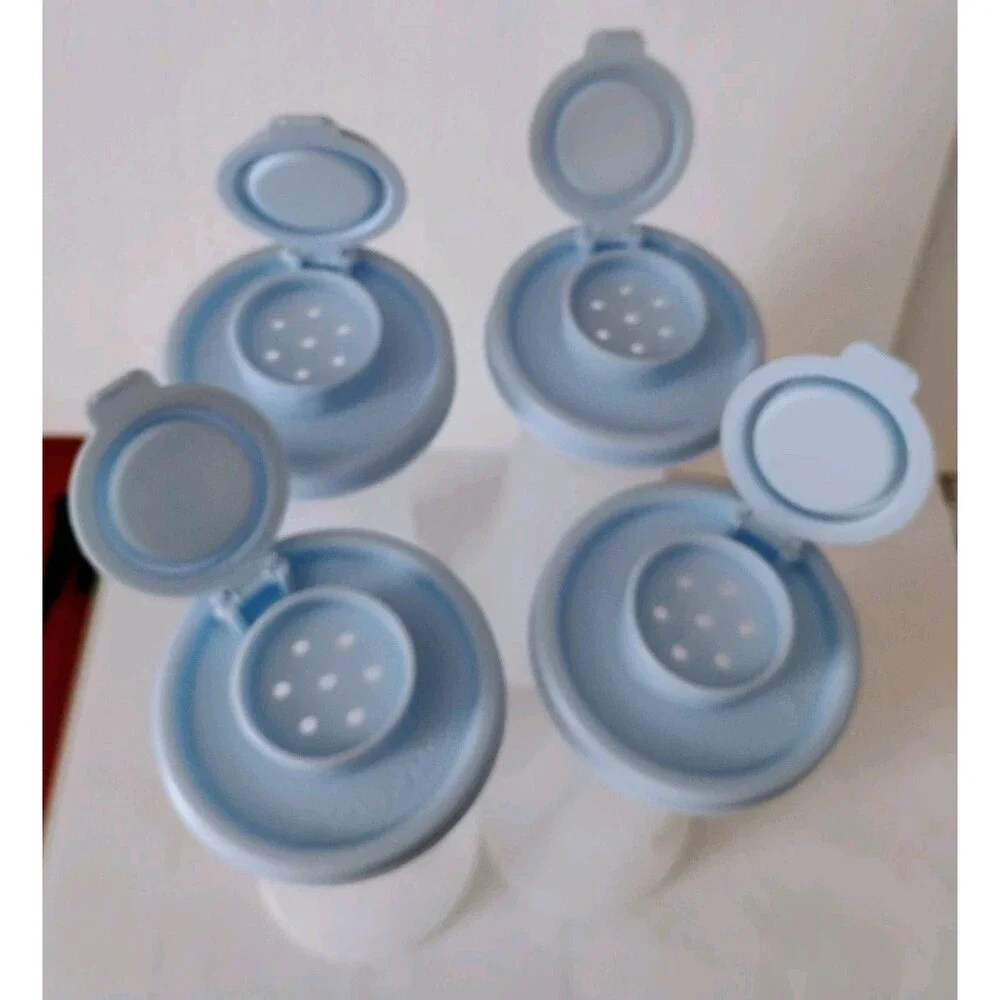 4 Tupperware Hourglass Salt & Pepper Shakers #718 Sheer Blue w/ Lid 5 7/8